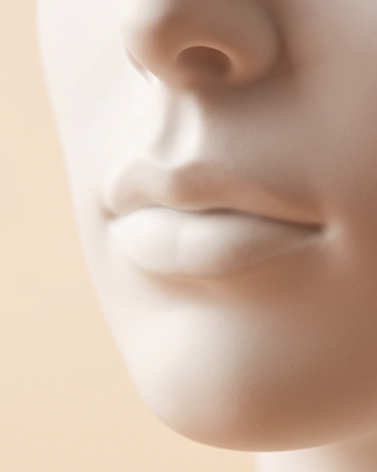 The upper lip area shown on a ceramic figure