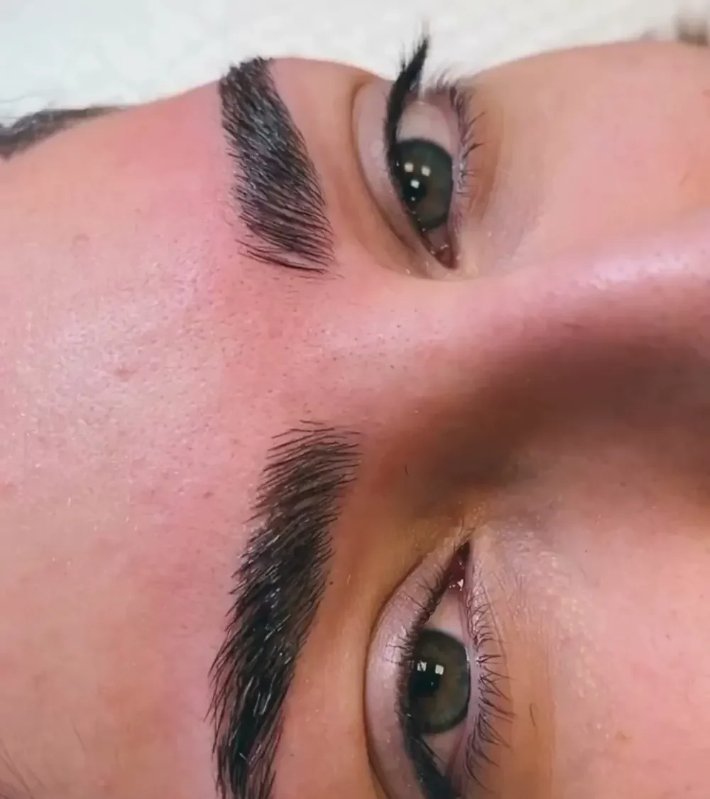 Close-up of finished brows