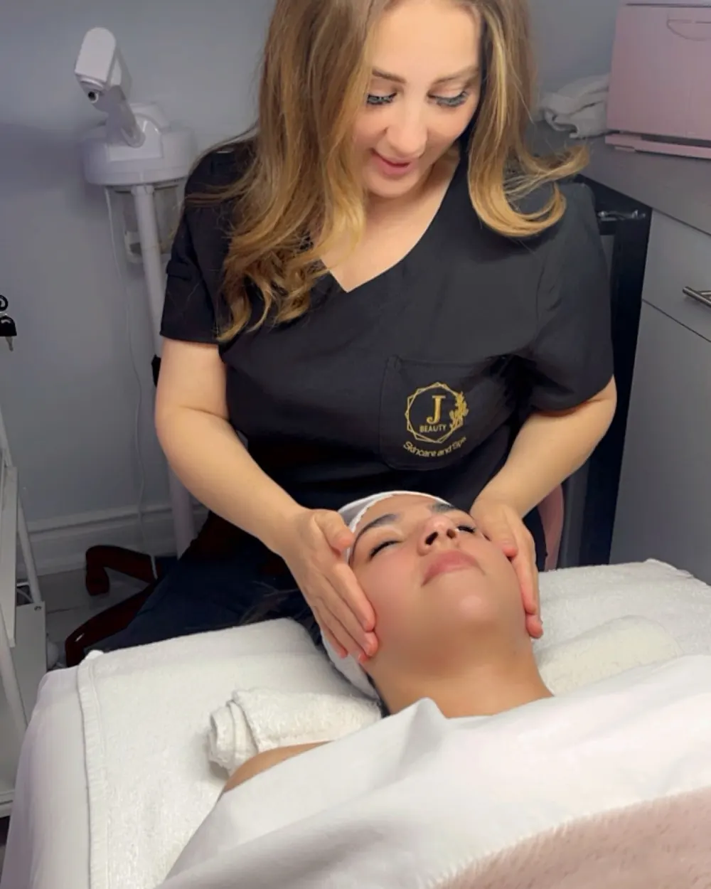 Jiman giving a facial massage
