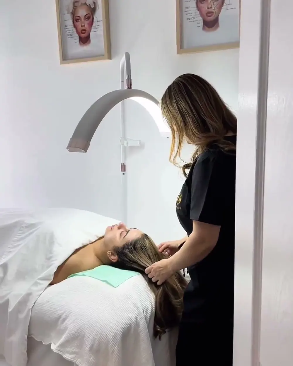 Jiman with a client in the treatment room at J Beauty